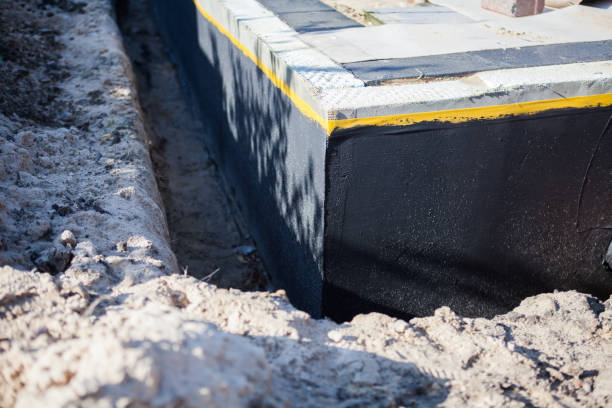 Professional Interior Drainage System technician working in Westover, AL